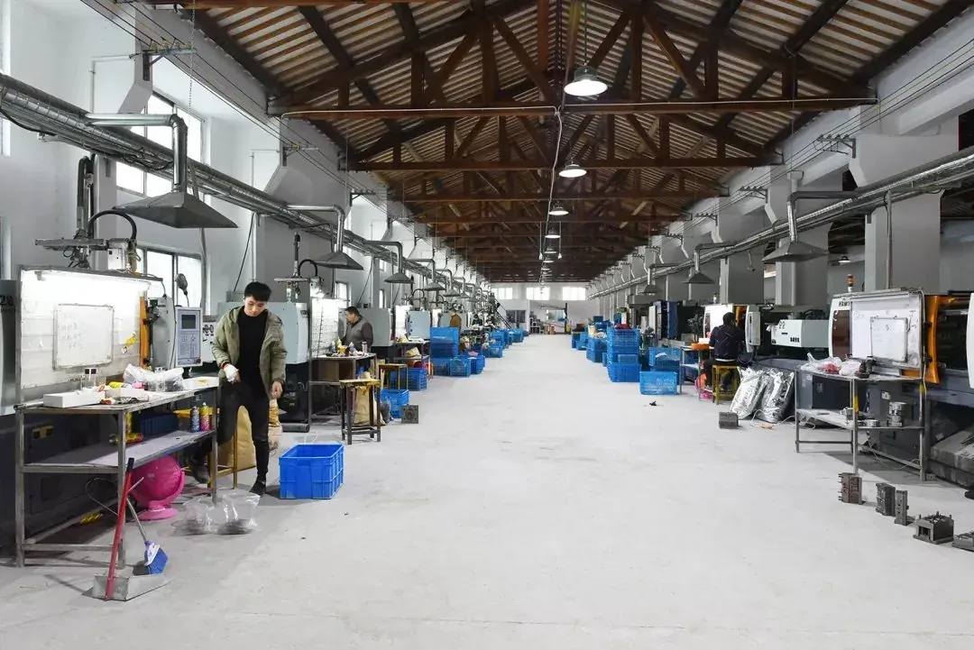 Injection molding machines producing eyewear frame components at our own eyewear factory